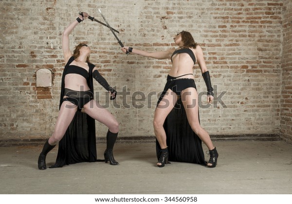 Two Women Fighting Swords Black Leather Stock Photo 344560958