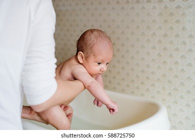 Unrecognizable Mother Bathing Her Son White Stock Photo