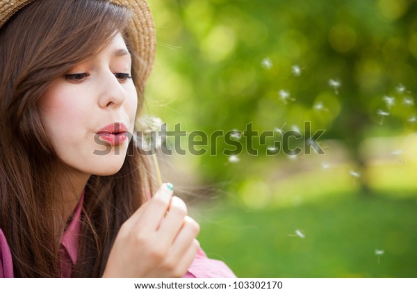 Woman Blowing Dandelion Stock Photo Shutterstock