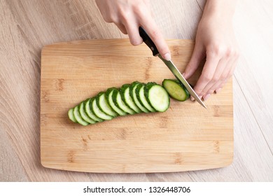 Kendall Cuts A Cucumber