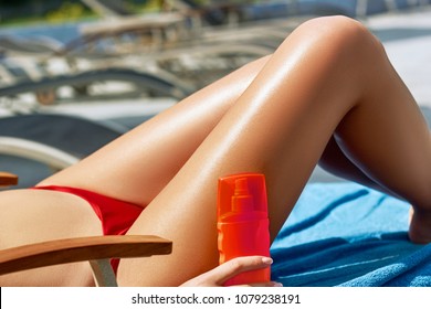 Sexy Suntan Bikini Woman Legs Relaxing Stock Photo