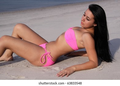 Woman Pink Bikini On Beach Shutterstock