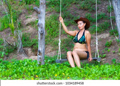 Woman Shape Pretty Bikini Swing On Stock Photo Edit Now 1034195725