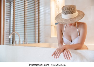 Woman Wearing Bikini Straw Hat Covering Stock Photo