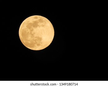 Full Moon Over Cold Night Water Shutterstock