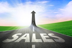 A road turning into an arrow rising upward symbolizing growth and improvement of sales