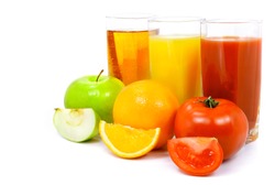 apple orange and tomato fruits with juice in the glass isolated over white background