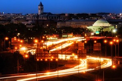 Traffic on a highway at night with a memorial in the background, Jefferson Memorial, Tidal Basin, Washington DC, USA