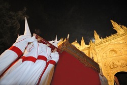 Procession during the Semana Santa in Salamanca, Spain.This is the Holy week before Easter.At the background the cathedral of Salamanca. The old city of Salamanca is an Unesco World Heritage site.