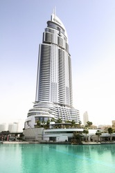 DUBAI, UAE - FEB 02: The Address Hotel in the downtown Dubai area overlooks the famous dancing fountains, taken on 3rd August 2010 in Dubai. The hotel is surrounded by a mall, hotels and Burj Khalifa