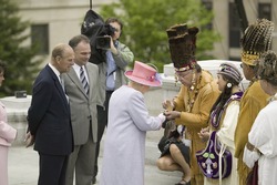 Her Majesty Queen Elizabeth II and the Duke of Edinburgh, Prince Philip receiving gift from Native American Indian Ceremony, Richmond Virginia, May 3, 2007