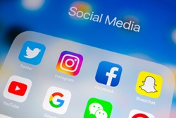 Sankt-Petersburg, Russia, April 1, 2018: Apple iPad with icons of social media facebook, instagram, twitter, snapchat application on screen. Social media icons. Social network