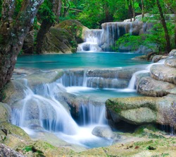 Blue stream waterfall in Kanjanaburi Thailand (Erawan waterfall Nation Park)