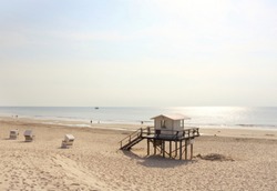 life guard tower on the beautiful beach of Westerland on a sunny evening in summer