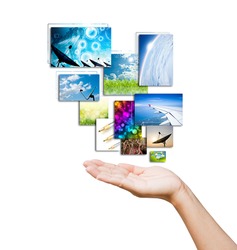 touch pad PC and streaming images buttons on women hand on background white