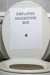 Porcelain Suggestion Box/Porcelain toilet with sign, "employee suggestion box" & arrow pointing down attached to lid