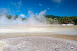 This image shows the Champagne Pool in Wai-O-Tapu Geothermal Wonderland, New Zealand