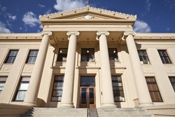 Warm afternoon light on County courthouse steps in rural central California.