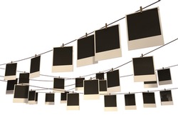 A gallery of blank photographs pegged onto red strings criss-crossed in various directions on an isolated background