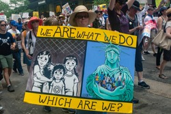 CHICAGO, ILLINOIS USA - JUNE 30, 2018: Demonstrators at the Families Belong Together rally protest the plight of migrant children separated from their families at the border.