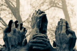 Remember detail of a war memorial. An expression of faith, hope, and disbelief of what lies behind us