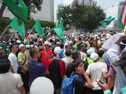 KUALA LUMPUR - SEPTEMBER 22 - A protest against Innocence Muslim, an anti-Islam film which enraged muslims globally, in front of the USA embassy on September 22, 2012. Kuala Lumpur