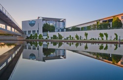 The Bundeskanzleramt (Kanzleramt) with panorama reflection, famous landmark in Berlin - Chancellery is the seat of the German federal government and the residence of the German Bundeskanzler