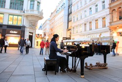 VIENNA - SEPT 23: Talented Pianist Soryang Plays Classical Music at Stefansplatz on September 23, 2012, in Vienna, Austria.