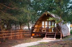 Wooden small house in traditional Indonesian style with terrace. Gili island, Lombok area