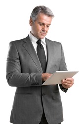 Smiling mature businessman working on digital tablet isolated on white background