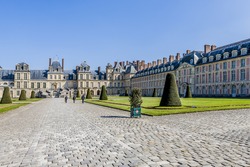 Beautiful Medieval landmark - royal hunting castle Fontainbleau. Palace of Fontainebleau - one of largest royal chateaux in France (55 km from Paris), UNESCO World Heritage Site.