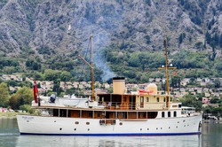 KOTOR, MONTENEGRO - OCTOBER 13: Motor Yacht Fair Lady in Kotory bay at October 13,2012. It is a 39 meter luxury yacht built in 1928. It accommodates 8 visiting passengers.