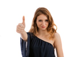 Beautiful smiling young woman close-up raises thumbs up, isolated on white background.