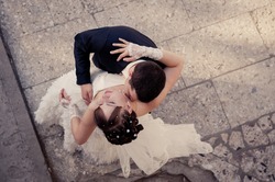 Happy young bride and groom on their wedding day. Wedding couple - new family! wedding dress. Bridal wedding bouquet of flowers