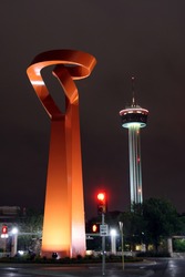 The Torch of Friendship and Tower of the Americas towners in downtown San Antonio, Texas.