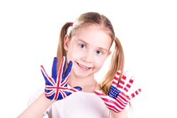 American and English flags on child's hands. Learning English language concept.