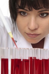 Scientist pathologist,. chemist or other lab worker takes a sample from test tube. closeup