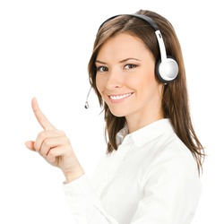 Portrait of happy smiling cheerful customer support phone operator in headset pointing at something, isolated over white background