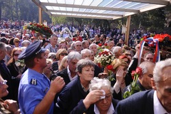 BELGRADE-OCTOBER 26: Serbian police officers hold back Tito supporters following the funeral of his widow, former Yugoslavia's first lady Jovanka Broz, in Belgrade, Serbia on October, 26, 2013