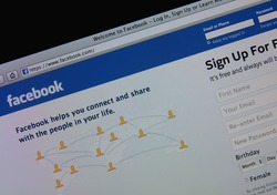 LISBON - JANUARY 23, 2014: Photo of Facebook homepage on a monitor screen. Facebook is an online social networking service.