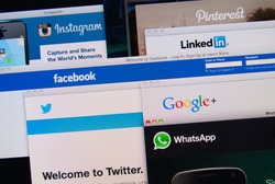 LISBON, PORTUGAL - MARCH 13, 2014: Photo of Pinterest, Twitter, Facebook, Google+, Linkedin, Whatsapp and Instagram homepage on a monitor screen. These are popular social networking websites.