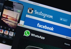 LISBON, PORTUGAL - MARCH 13, 2014: Photo of Facebook, Instagram and Whatsapp homepage on a monitor screen Facebook owns Instagram and Whatsapp.