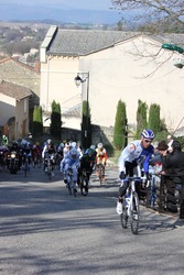 ALLEX, FRANCE - MAR 02: Unidentified professional cyclist riding La Classic Drome UCI Europe Tour Pro Race on March 02, 2014 in Allex Hill, Drome, France. Romain Bardet won the race.