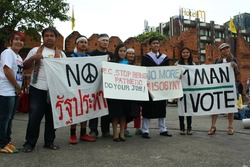 CHIANG MAI,THAILAND-JAN18: Atmosphere while people including university students joining an activity of anti-coup by symbolic speech as 3minutes talk & do vigil candle for peace, On Jan18, 2014.
