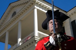 Man in British military dress at Revolutionary War Re-Enactment in Camden, South Carolina.