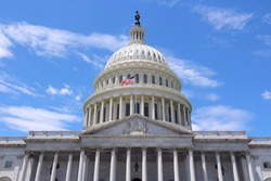 Washington DC, capital city of the United States. National Capitol building with US flag.