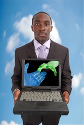 This is an image of a man holding a laptop. This image can be used represent "Network" concepts.