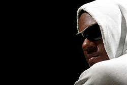 Young african american male on black background
