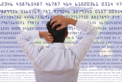 Crisis Concept - Stressed man looking to statistic numbers