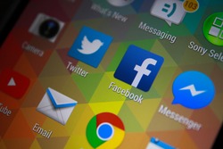 BANGKOK-JANUARY11 2015: Facebook Icon on Phone. Facebook is an online social networking service headquartered in Menlo Park, California.